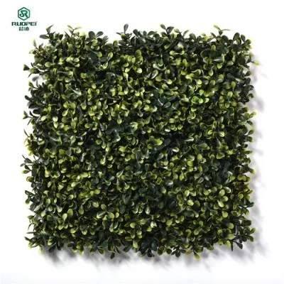 緑のプラスチックリーフフェンスの壁の装飾